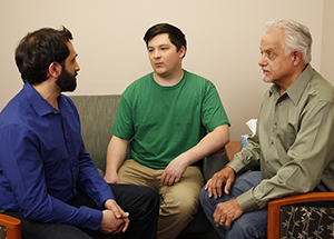 Three men in support group.